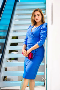 Midi jurk licht blauw pofmouwen